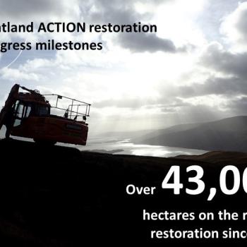 Silhouette of a digger on an upland Peatland ACTION restoration site with a loch in the background. Caption says &amp;quot;Peatland ACTION restoration progress milestones over 43,000 hectares on the road to restoration since 2012&amp;quot;  (Data August 2023). IMAGE: ©R.J.Cooper