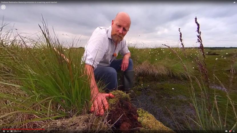 Andrew McBride (Peatland ACTION/SNH) discussing the merits peat bogs have in tacking climate change. Still from James Hutton Institute film peat and carbon
