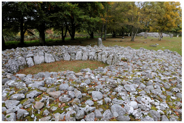 Clava Cairns. This a circular cairn made of stones. 