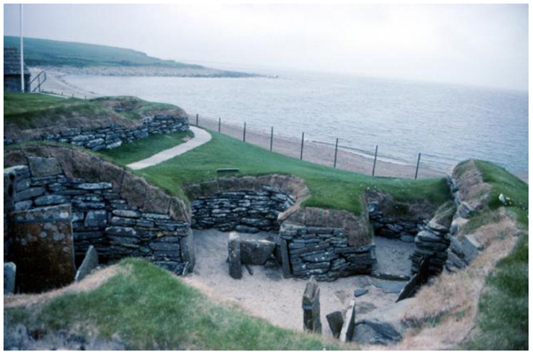 Sunken remains of curved Neolithic stone walled structures