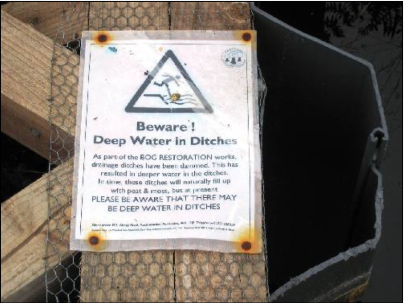 warning sign about deep water in ditches 
