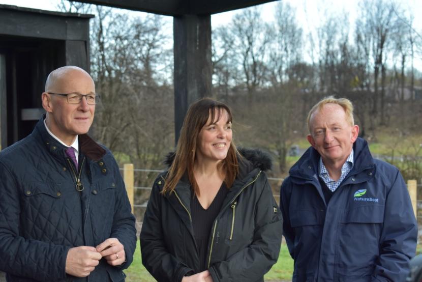 Rosie, flanked by John Swinney (Deputy First Leader) MSP, and Mike Cantlay (Chair of NatureScot).