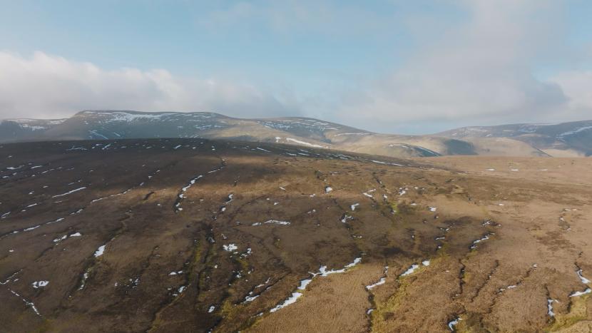 Aerial photograph showing a network of gullies and moorland grips.&nbsp;The remote and exposed site made conditions challenging.