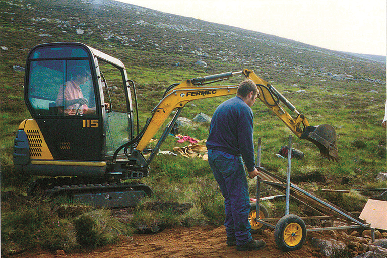 Machinery used to grade path materials on a path site.