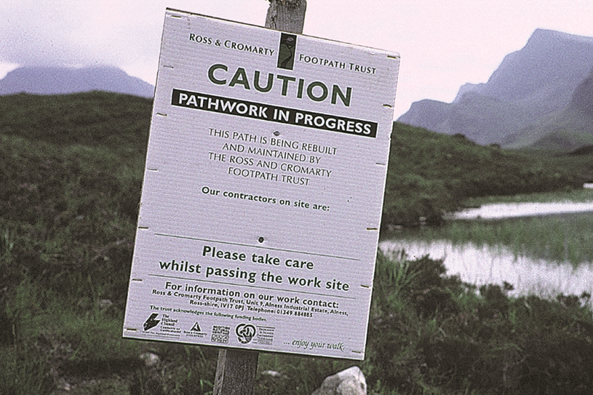 Sign warning people that pathwork is being undertaken