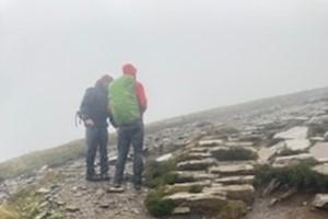 Eroded pitching and aggregate path near the summit 