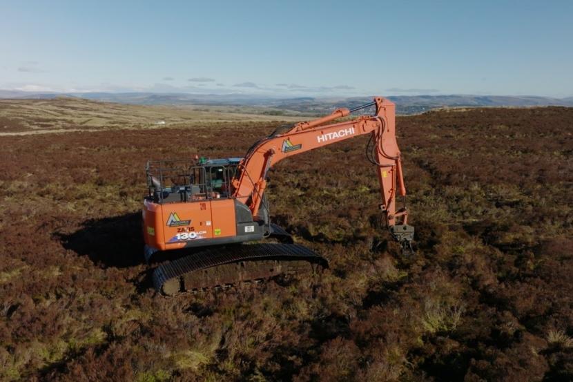 A digger in action restoring drained peatland ©NatureScot Peatland ACTION/Swift Films.