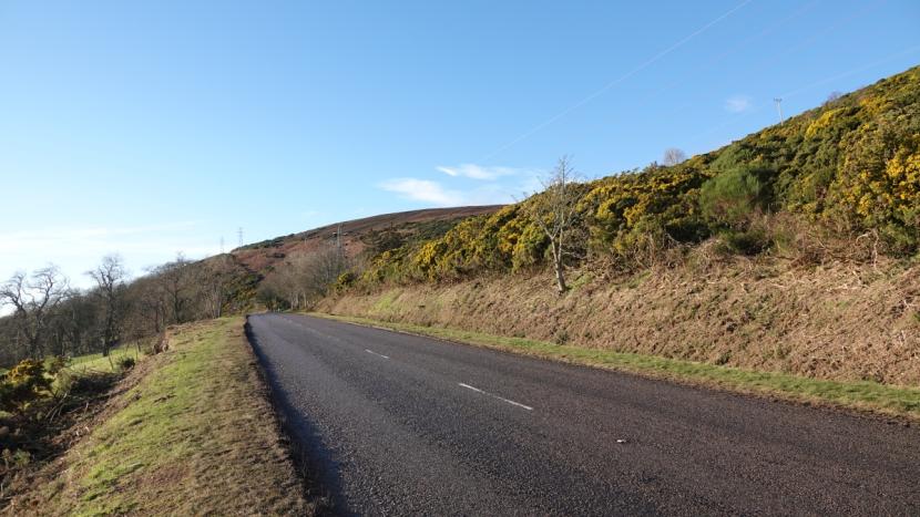 The A9 road showing extensive recent scrub clearance along verges on both sides.