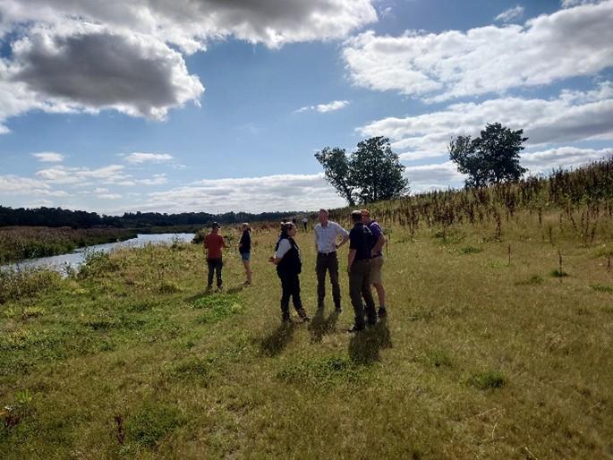 NatureScot Photo of same reach of the river Feb 2024  and August 2025 during and post bank re-alignment.