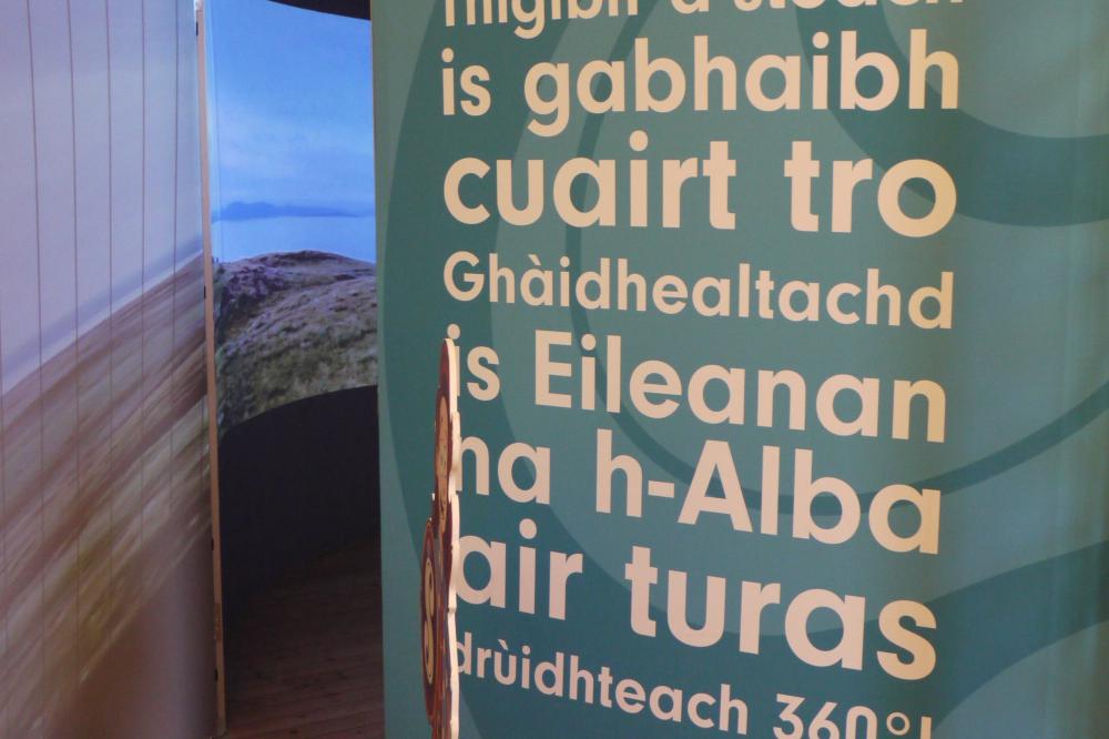 Spirit's Immersive 360 degree portal, with the Gaelic wording on the side, next to the open door.