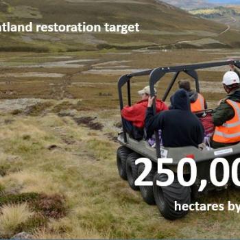 Contractors heading out to a peatland restoration site on an All Terrain Vehicle with caption saying "Peatland restoration target of 250,000 hectares by 2030". ©Lorne Gill/NatureScot