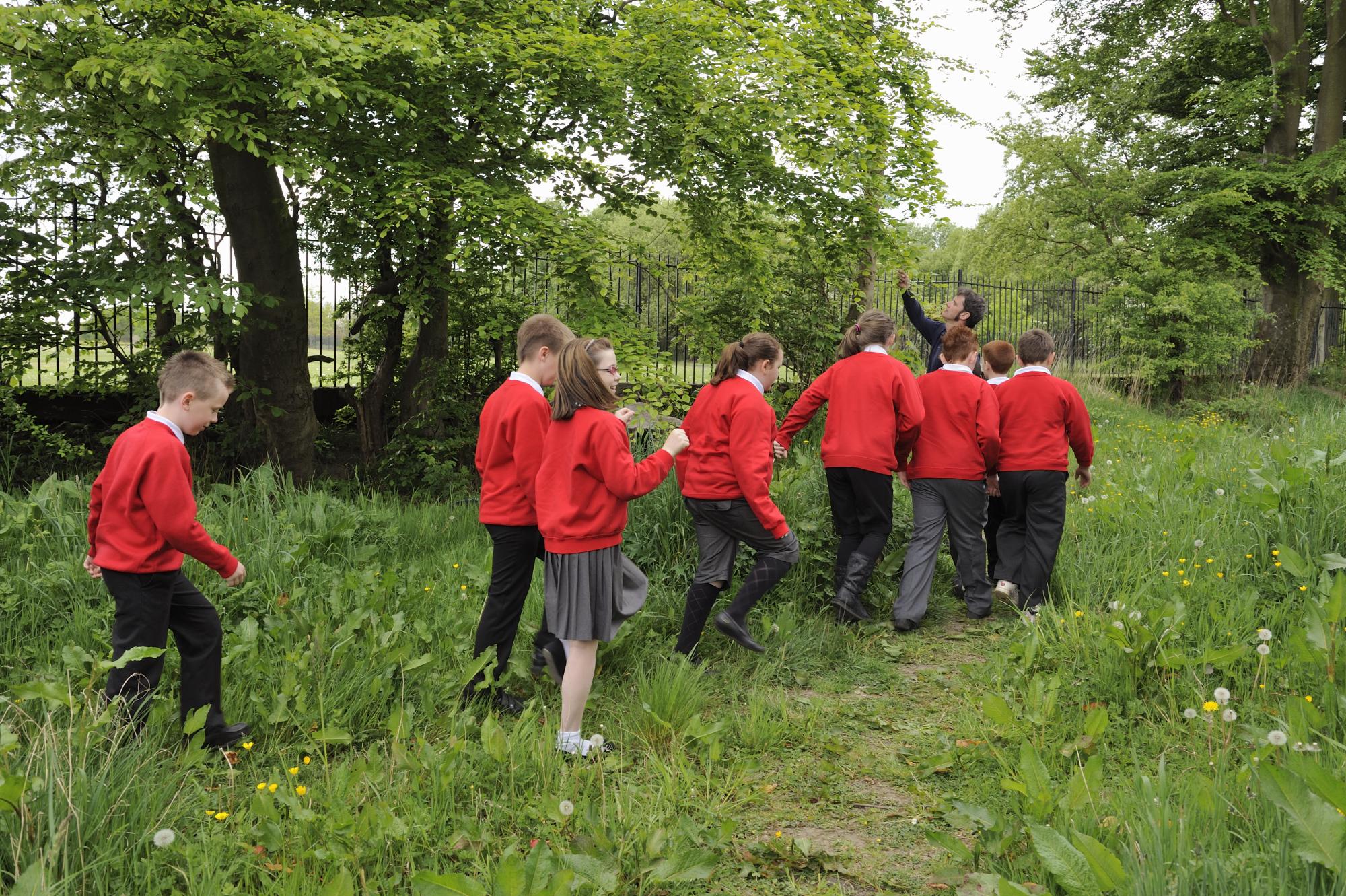 School children on a ranger led nature walk near Carmunnock cemetery, Glasgow as part of biodiversity week. ©Lorne Gill/SNH. For information on reproduction rights contact the Scottish Natural Heritage Image Library on Tel. 01738 444177 or www.nature.scot